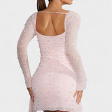 Sónia | Mini robe à paillettes et décolleté