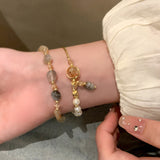 Bracelet élégant en cristaux et pierres précieuses